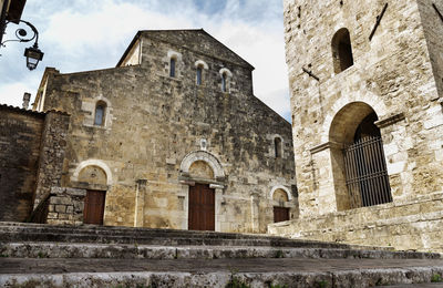 Low angle view of old building against sky