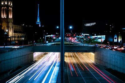 High angle view of light trails on city street at night