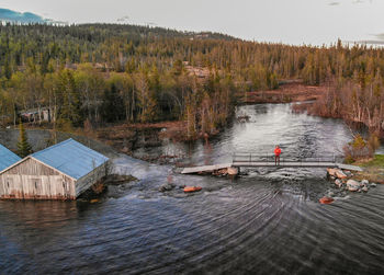 High angle view of man on bridge over river