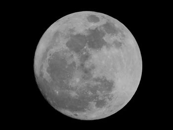 Close-up of moon against clear sky at night