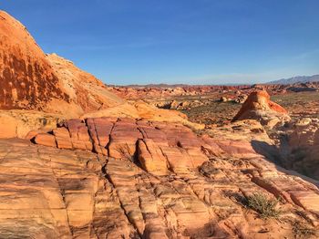 Scenic view of desert against clear sky