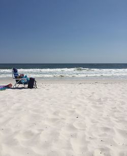 Scenic view of beach against clear sky