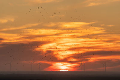 Scenic view of dramatic sky during sunset