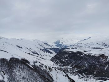 Snow covered mountain against sky