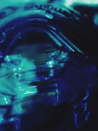 Close-up of water drops on blue background