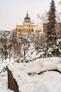 White building against sky during winter