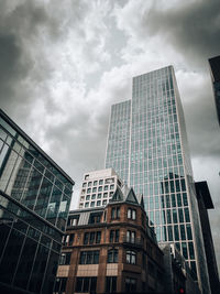 Low angle view of modern buildings against sky