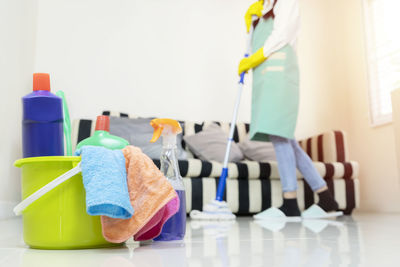 Woman cleaning floor at home