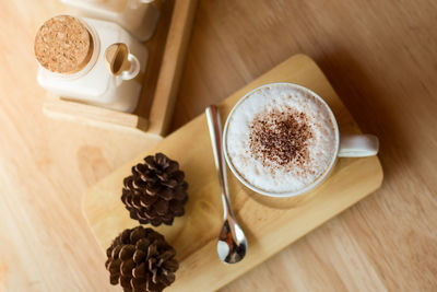 High angle view of coffee cup on table