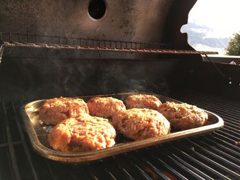 Close-up of meat on barbecue grill