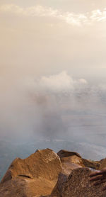 Rock formations on landscape against sky