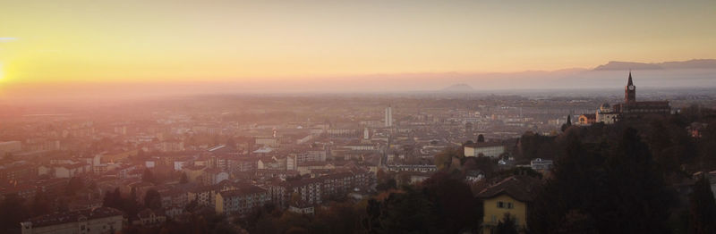 High angle view of cityscape against sky during sunset