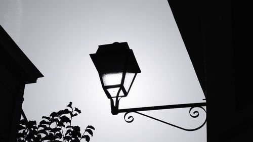 Low angle view of basketball hoop against clear sky