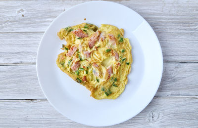 Directly above shot of omelet served in plate on table