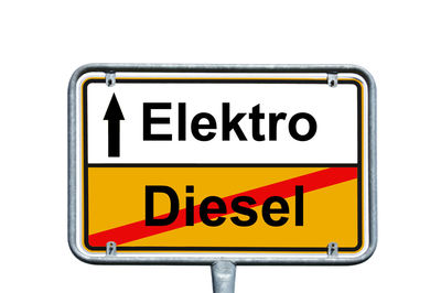 Close-up of road sign against white background