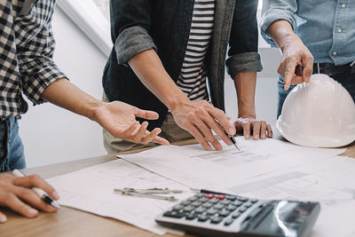 Group of people working on table