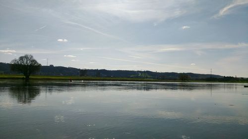 View of lake against cloudy sky