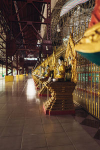 Illuminated building interior. buddha. temple. 