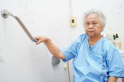 Portrait of senior female patient in bathroom at hospital