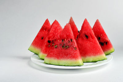 Close-up of fruits in plate on table