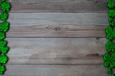 Directly above shot of wooden plank on table