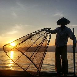 Woman looking at sunset