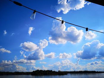 Low angle view of street light against sky