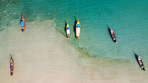 High angle view of people on boat in sea