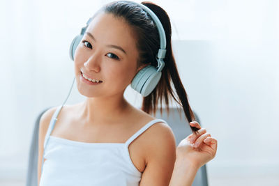 Smiling woman with headphones