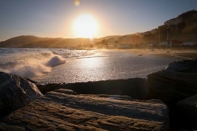 Scenic view of sea against sky during sunset