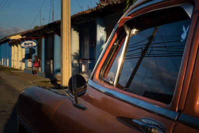 Close-up of car against sky