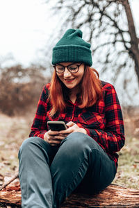 Young woman using mobile phone