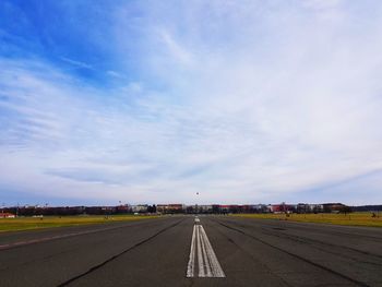 Empty road against sky