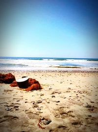 Scenic view of beach against clear sky