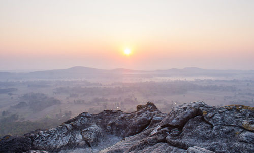 Scenic view of mountains against sky during sunset