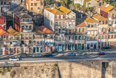 Houses by street in city