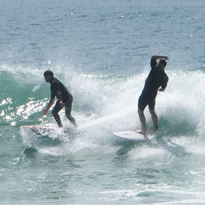 Full length of man splashing water in sea