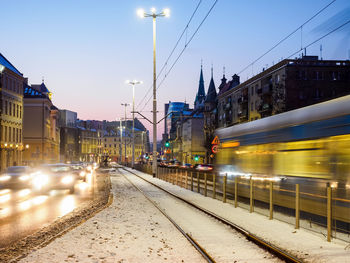 Modern tram in motion blur, city public transportation