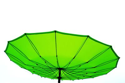 Low angle view of umbrella against clear sky