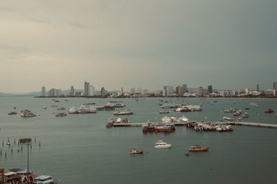 High angle view of harbor by sea against sky