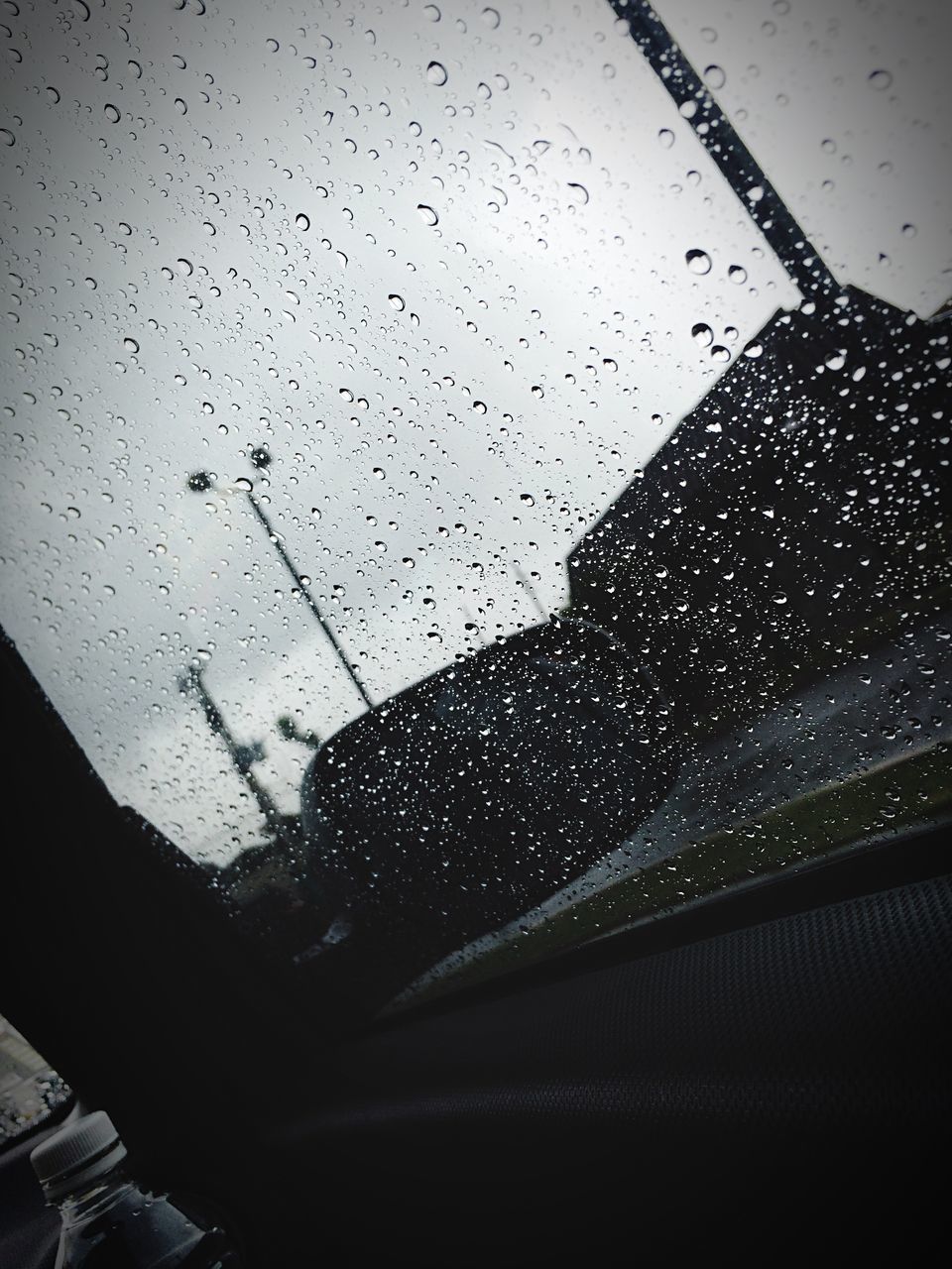 water, window, drop, wet, silhouette, rain, transparent, glass - material, cloud, sky, mountain, nature, outline, day, scenics, dark, flying, mountain range, tranquility, tranquil scene