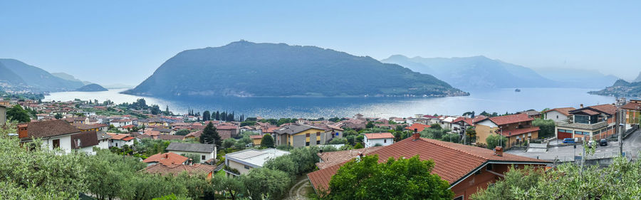 Extra wide view of monte isola in the lake iseo
