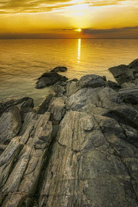 Scenic view of sea against sky during sunset