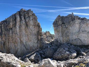 Rock formation on land against sky