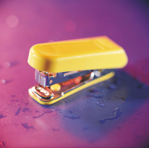 Close up of yellow stapler