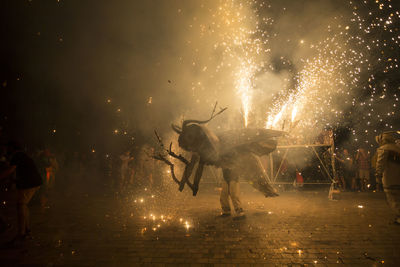 Firework display at night