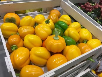 High angle view of vegetables in crate at market stall