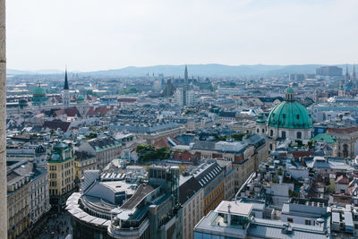 High angle view of buildings in city against sky