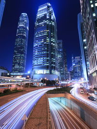 High angle view of illuminated buildings in city at night