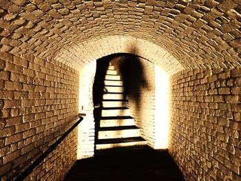 Man seen through archway